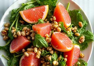 Citrus salad with fresh local greens, grapefruit segments, and toasted nuts with light vinaigrette